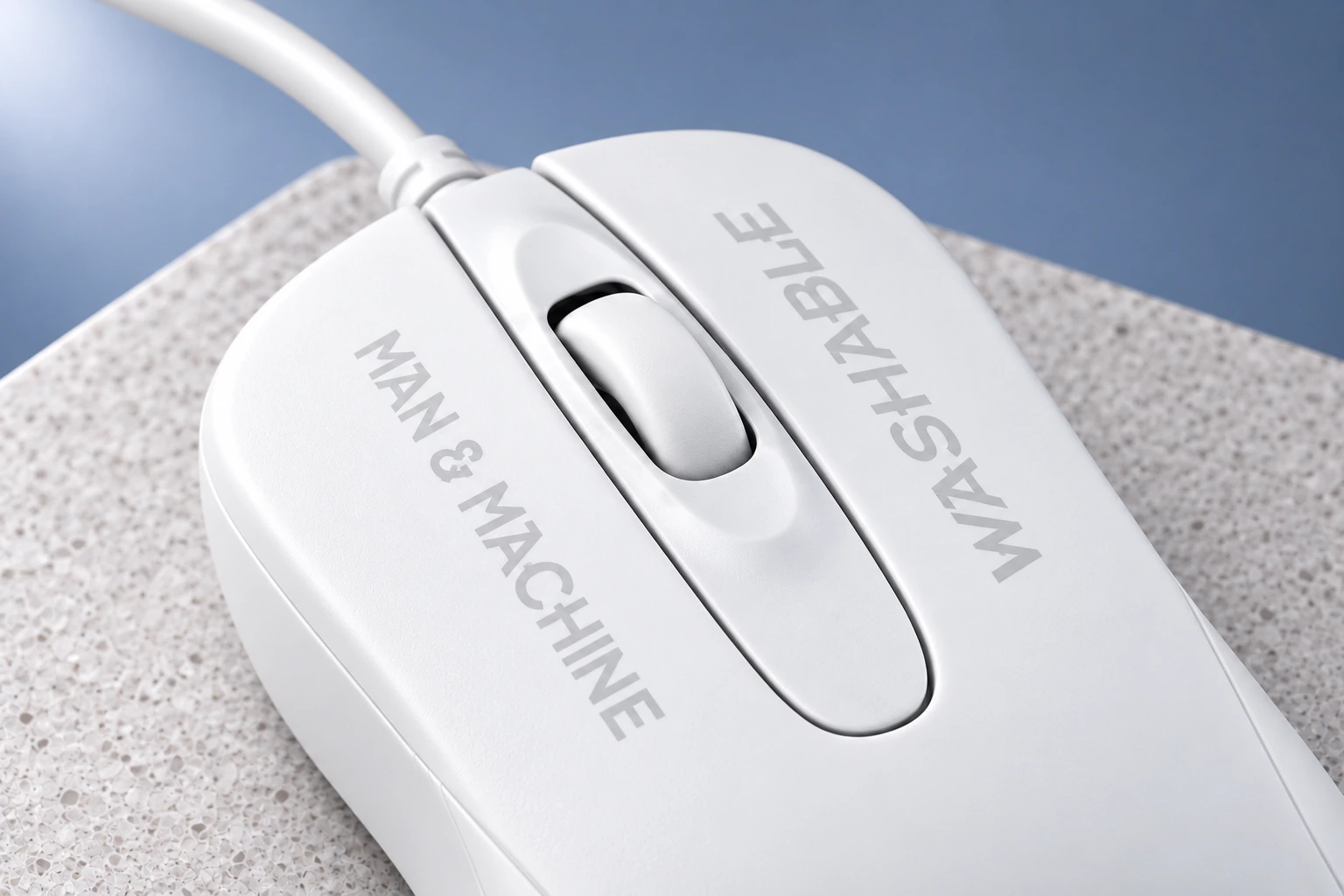 Man & Machine C Mouse · blanche, détail du produit en studio.